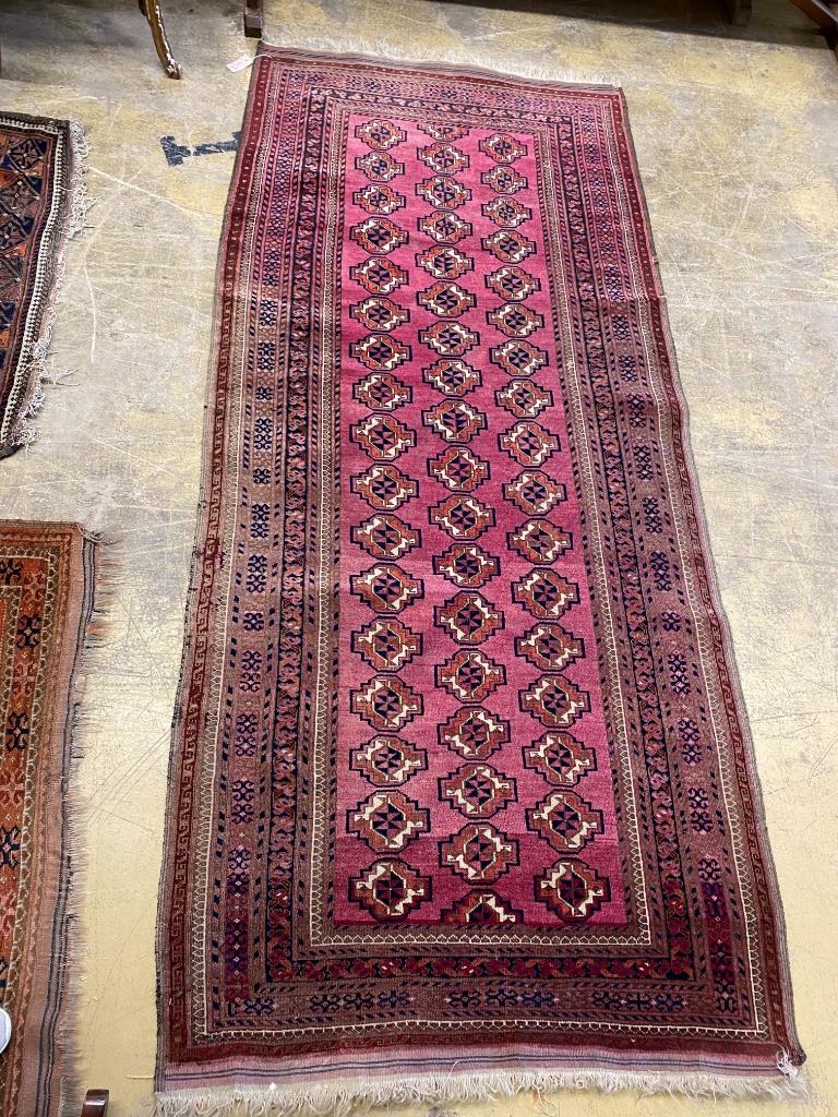 A Tekke Bokhara red ground rug, 254 x 109cm